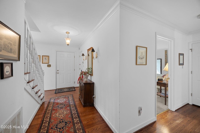 103 Camelia Dr, Washington, NC 27889 - hallway featuring wood finished floors, ornamental molding, stairs, and baseboards