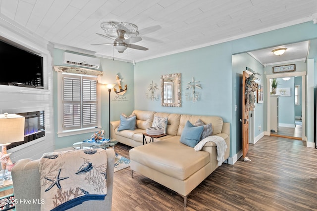 209 W St George St, Southport, NC 28461 - living area featuring a wall unit AC, ceiling fan, wood finished floors, ornamental molding, and healthy amount of natural light