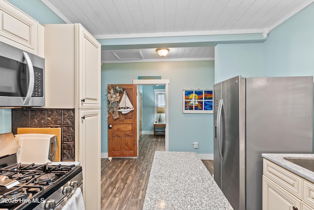 209 W St George St, Southport, NC 28461 - kitchen with appliances with stainless steel finishes, dark wood-style floors, wood ceiling, crown molding, and light stone counters