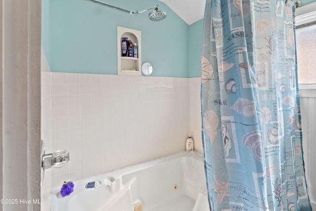 209 W St George St, Southport, NC 28461 - full bath featuring a combined bath / shower with jetted tub and vaulted ceiling