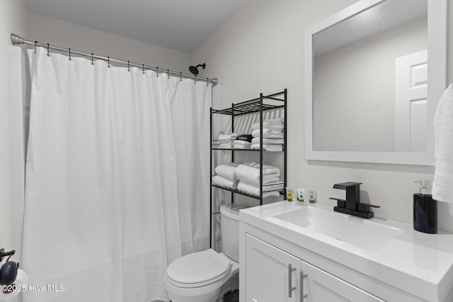 5302 Autumn Dr, Wilmington, NC 28409 - bathroom featuring toilet, vanity, and curtained shower