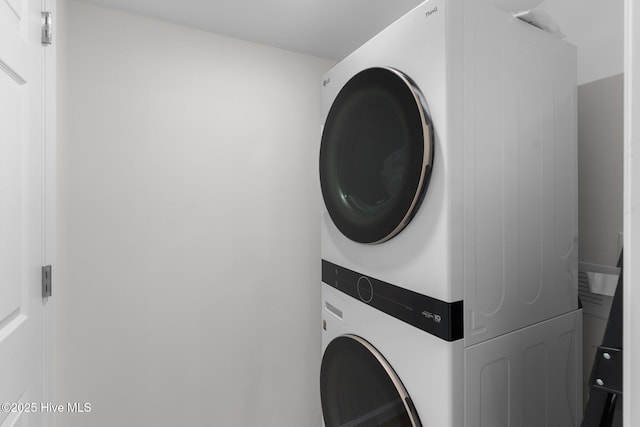 5302 Autumn Dr, Wilmington, NC 28409 - washroom featuring stacked washing machine and dryer