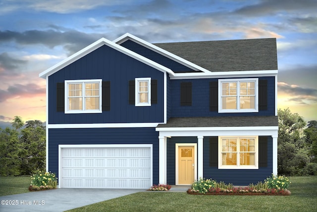 246 Kite Cir NE Lot 667, Bolivia, NC 28422 - traditional home featuring an attached garage, a shingled roof, driveway, and a front yard