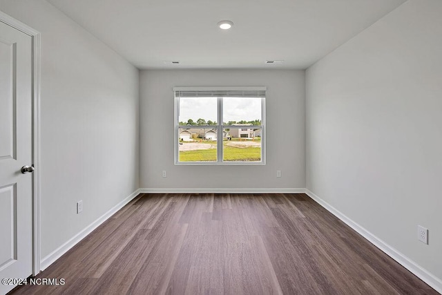 246 Kite Cir NE Lot 667, Bolivia, NC 28422 - empty room featuring dark wood finished floors and baseboards
