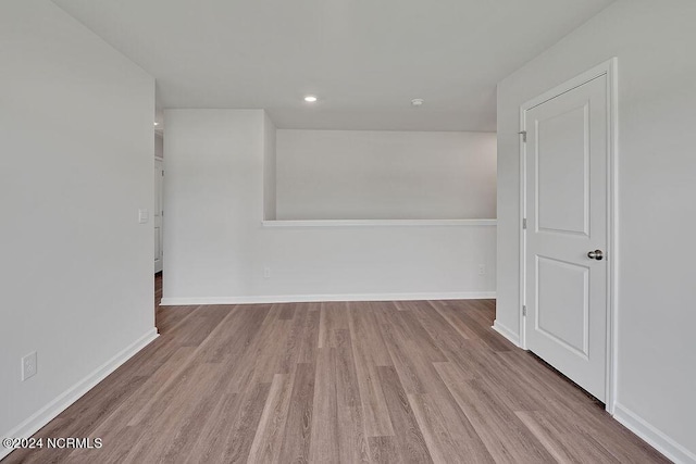 246 Kite Cir NE Lot 667, Bolivia, NC 28422 - empty room featuring wood finished floors, baseboards, and recessed lighting