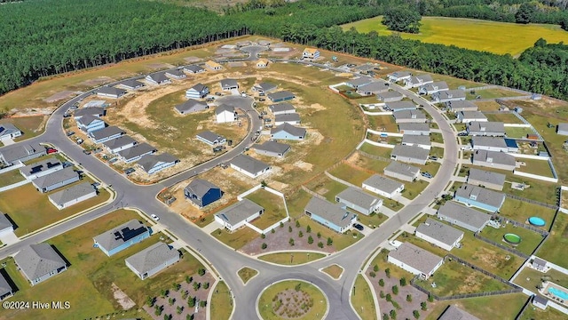246 Kite Cir NE Lot 667, Bolivia, NC 28422 - aerial view of property's location with a heavily wooded area