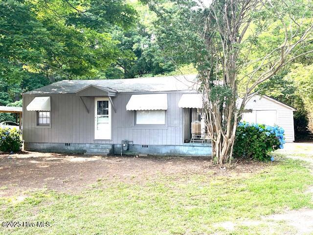3356 Howard Ave, Tarboro, NC 27886 - manufactured / mobile home featuring crawl space, entry steps, and a front lawn