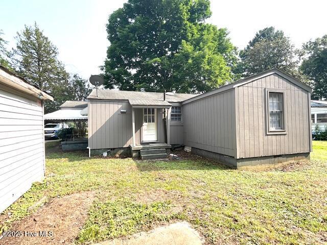 3356 Howard Ave, Tarboro, NC 27886 - back of property featuring a lawn