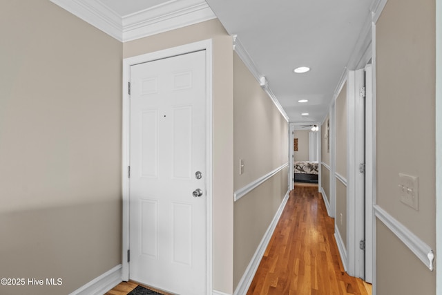 612 N Carolina Beach Ave Unit 3A, Carolina Beach, NC 28428 - corridor with ornamental molding, light wood-type flooring, recessed lighting, and baseboards