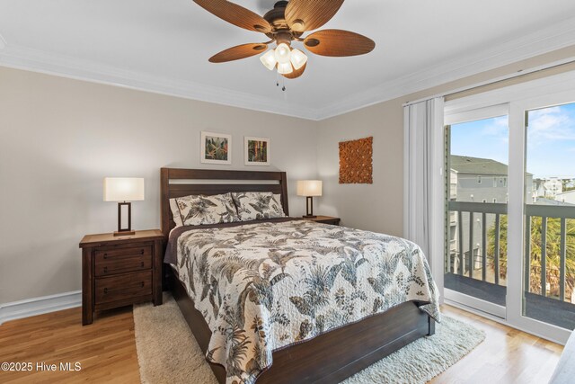 612 N Carolina Beach Ave Unit 3A, Carolina Beach, NC 28428 - bedroom featuring access to exterior, wood finished floors, crown molding, baseboards, and ceiling fan