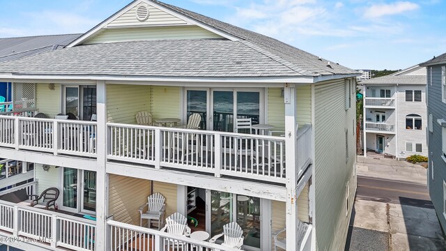 612 N Carolina Beach Ave Unit 3A, Carolina Beach, NC 28428 - view of property exterior with a shingled roof