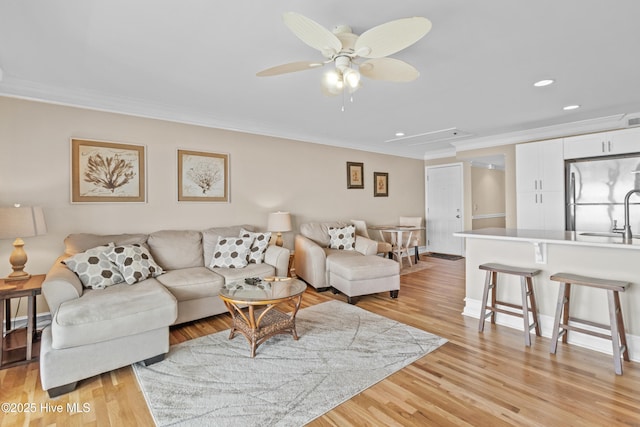 612 N Carolina Beach Ave Unit 3A, Carolina Beach, NC 28428 - living area featuring crown molding, attic access, light wood-style floors, recessed lighting, and a ceiling fan