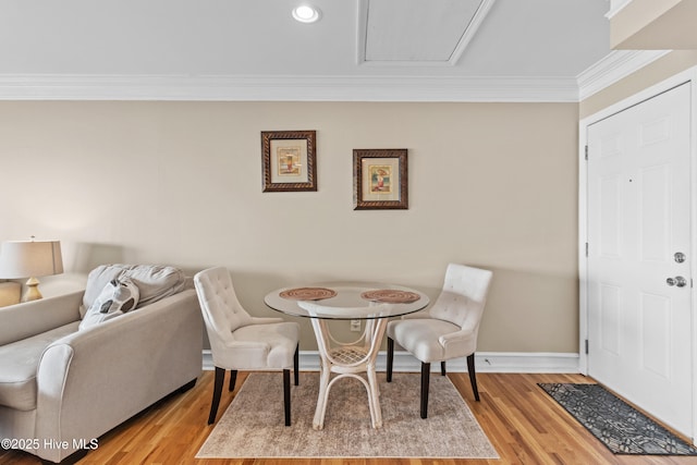 612 N Carolina Beach Ave Unit 3A, Carolina Beach, NC 28428 - dining area featuring ornamental molding, baseboards, light wood finished floors, and recessed lighting