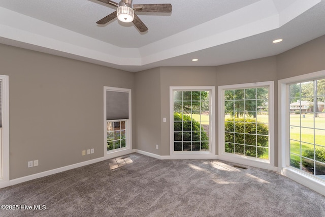 24 Mcnish Rd, Southern Pines, NC 28387 - spare room featuring carpet floors, a ceiling fan, baseboards, recessed lighting, and a raised ceiling