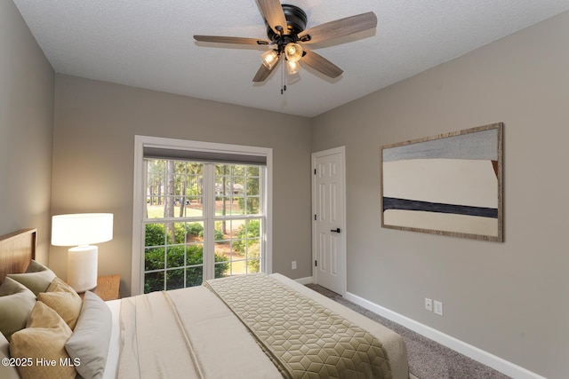 24 Mcnish Rd, Southern Pines, NC 28387 - carpeted bedroom featuring baseboards and a ceiling fan