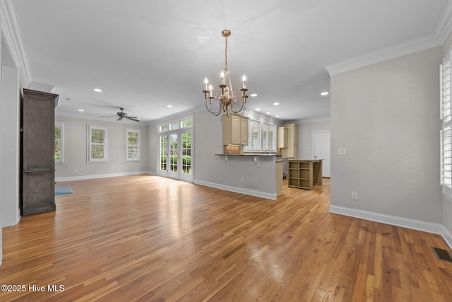 30 Deacon Palmer Pl, Southern Pines, NC 28387 - unfurnished living room with crown molding, recessed lighting, a chandelier, light wood finished floors, and ceiling fan