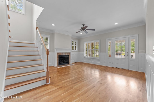 30 Deacon Palmer Pl, Southern Pines, NC 28387 - unfurnished living room with ceiling fan, stairs, a fireplace with raised hearth, recessed lighting, and healthy amount of natural light
