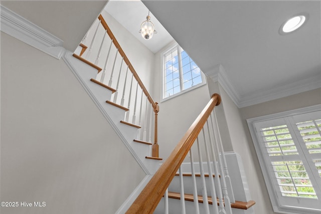 30 Deacon Palmer Pl, Southern Pines, NC 28387 - staircase with ornamental molding and a chandelier