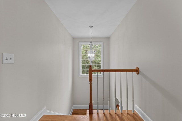 30 Deacon Palmer Pl, Southern Pines, NC 28387 - stairs with a chandelier and wood finished floors
