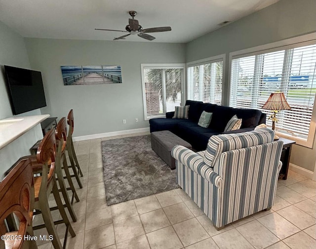 104 S 3rd St Unit H2, Morehead City, NC 28557 - living area with light tile patterned floors, a ceiling fan, and baseboards