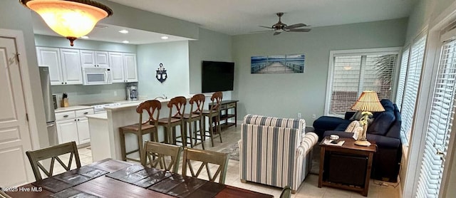 104 S 3rd St Unit H2, Morehead City, NC 28557 - dining space featuring a ceiling fan, light tile patterned flooring, and recessed lighting