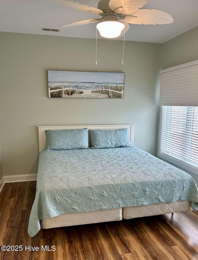 104 S 3rd St Unit H2, Morehead City, NC 28557 - bedroom featuring wood finished floors, baseboards, and ceiling fan