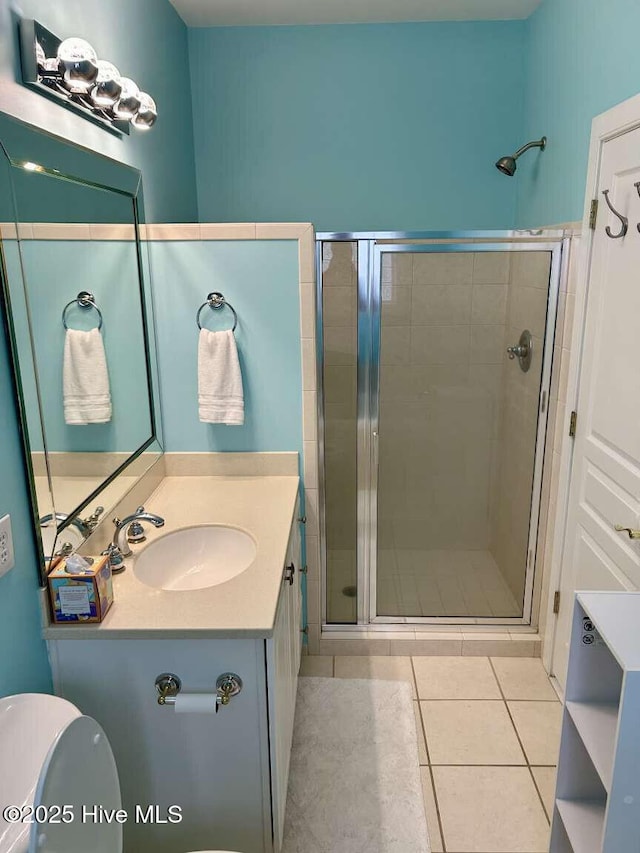 104 S 3rd St Unit H2, Morehead City, NC 28557 - bathroom featuring vanity, a shower stall, and tile patterned floors
