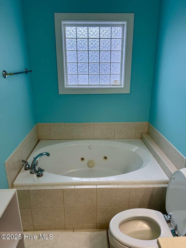 104 S 3rd St Unit H2, Morehead City, NC 28557 - bathroom featuring toilet and a jetted tub