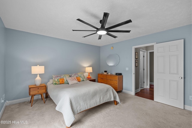 8122 Bahia Honda Dr, Wilmington, NC 28412 - bedroom featuring carpet, baseboards, and a ceiling fan