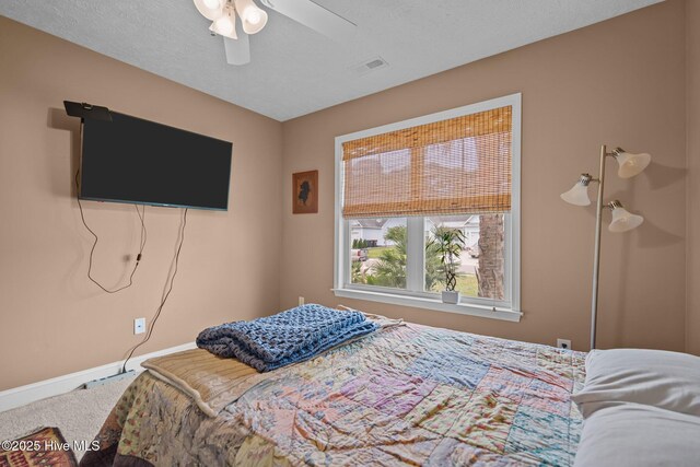 8122 Bahia Honda Dr, Wilmington, NC 28412 - bedroom with baseboards, carpet flooring, and a ceiling fan
