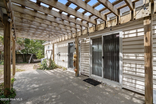 8122 Bahia Honda Dr, Wilmington, NC 28412 - view of patio featuring a pergola