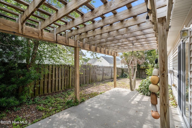 8122 Bahia Honda Dr, Wilmington, NC 28412 - fenced backyard with a patio area and a pergola