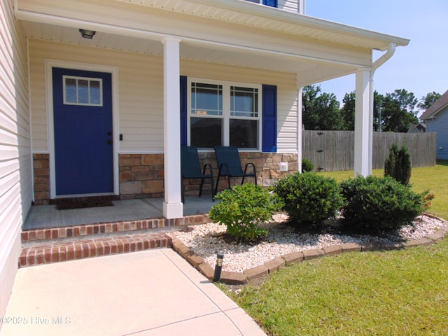 205 Brice Ct, Hubert, NC 28539 - doorway to property with covered porch and stone siding