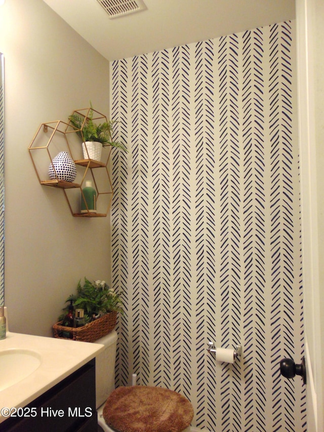205 Brice Ct, Hubert, NC 28539 - bathroom featuring vanity and toilet