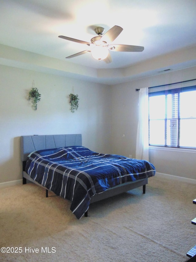 205 Brice Ct, Hubert, NC 28539 - bedroom with carpet, baseboards, and a ceiling fan