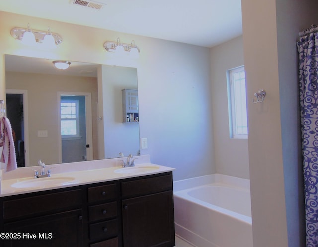 205 Brice Ct, Hubert, NC 28539 - full bath with double vanity and a bath