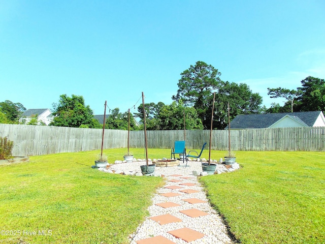 205 Brice Ct, Hubert, NC 28539 - view of yard featuring an outdoor fire pit and a patio area