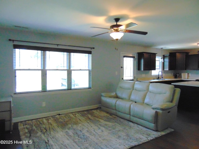205 Brice Ct, Hubert, NC 28539 - living room with a ceiling fan, baseboards, and wood finished floors