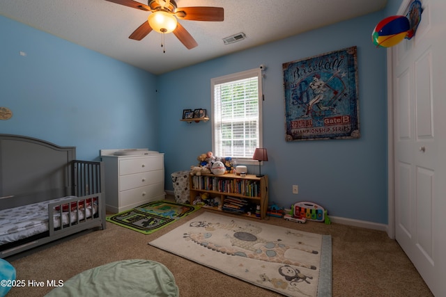 306 Top Knot Rd, Hubert, NC 28539 - carpeted bedroom with a nursery area, baseboards, and a ceiling fan