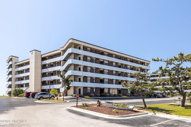 1505 Salter Path Rd Unit 328, Indian Beach, NC 28512 - view of apartment building / complex featuring uncovered parking