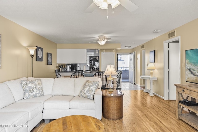 1505 Salter Path Rd Unit 328, Indian Beach, NC 28512 - living room with ceiling fan and light wood-type flooring
