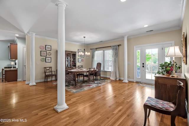 4301 Gainesford Ct, Wilmington, NC 28412 - dining space featuring ornate columns, light wood-type flooring, baseboards, crown molding, and recessed lighting