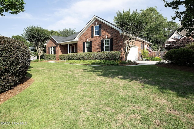 4301 Gainesford Ct, Wilmington, NC 28412 - view of front facade featuring brick siding, a garage, and a front lawn