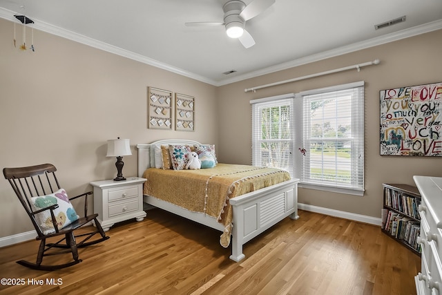 4301 Gainesford Ct, Wilmington, NC 28412 - bedroom with crown molding, light wood finished floors, baseboards, and ceiling fan