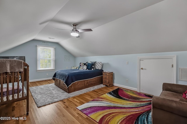 4301 Gainesford Ct, Wilmington, NC 28412 - bedroom with wood finished floors, ceiling fan, vaulted ceiling, and baseboards
