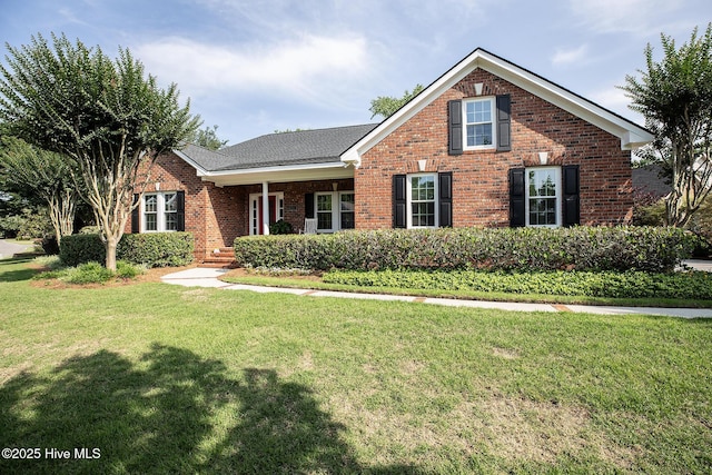 4301 Gainesford Ct, Wilmington, NC 28412 - view of front of house featuring brick siding and a front yard
