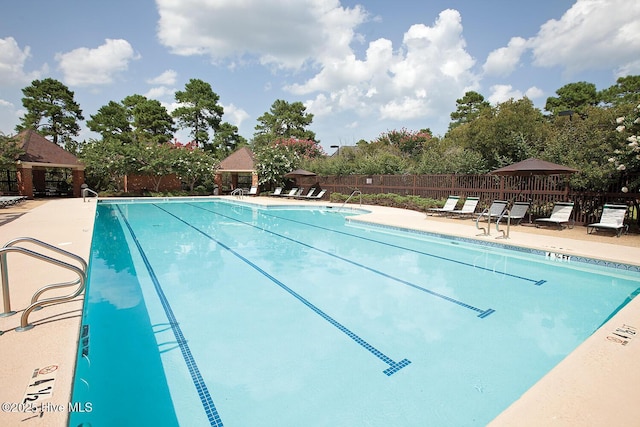 4301 Gainesford Ct, Wilmington, NC 28412 - community pool featuring a patio area and a gazebo