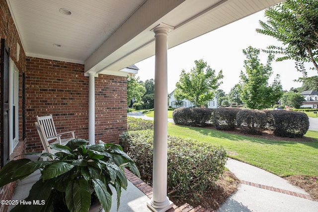 4301 Gainesford Ct, Wilmington, NC 28412 - porch featuring a lawn