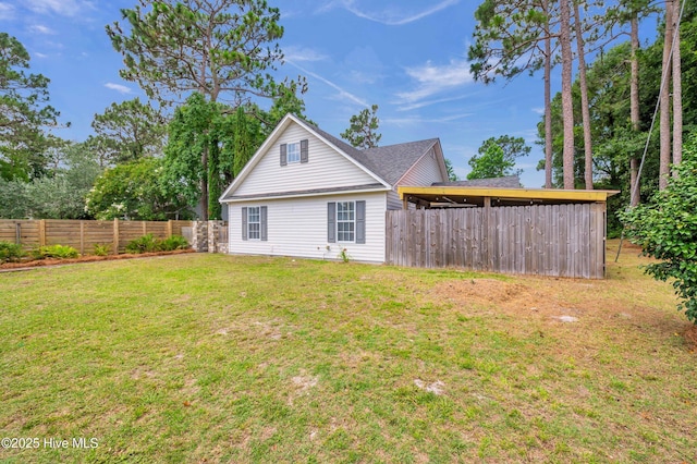 711 Navaho Trl, Wilmington, NC 28409 - rear view of house with a fenced backyard