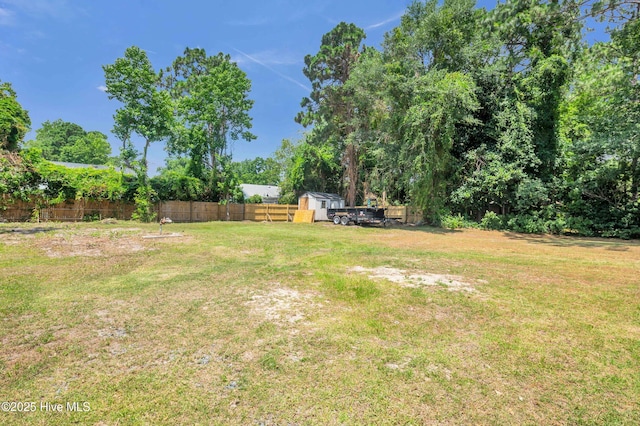 711 Navaho Trl, Wilmington, NC 28409 - view of yard with a storage shed